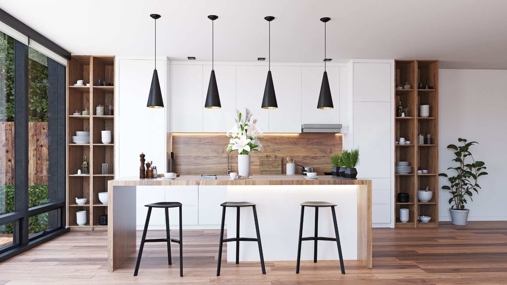 Modern kitchen with white cabinets, wooden island, and black pendant lights